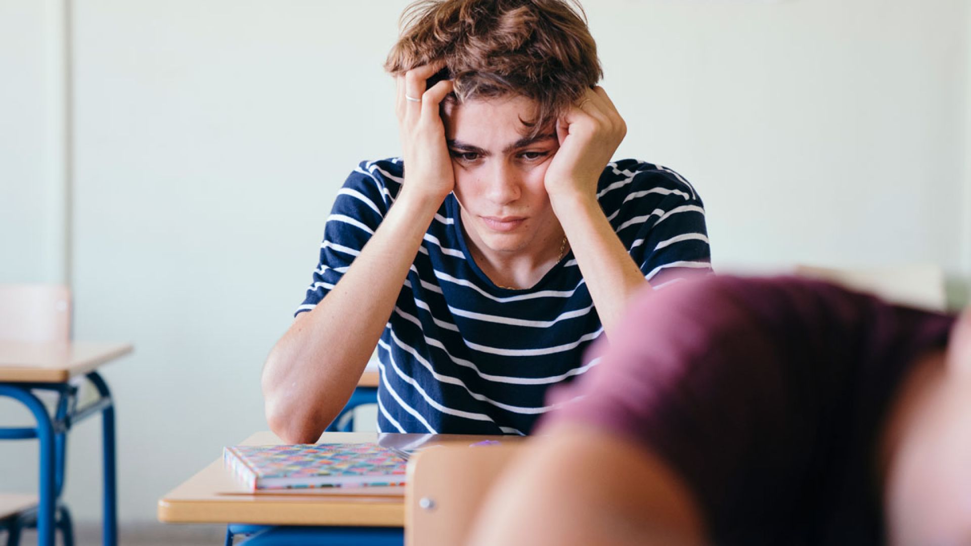 stressed teenager in classroom